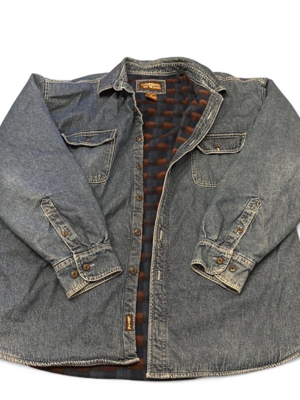 Vintage Levi’s Blue denim button-up coat with plaid fleece lining